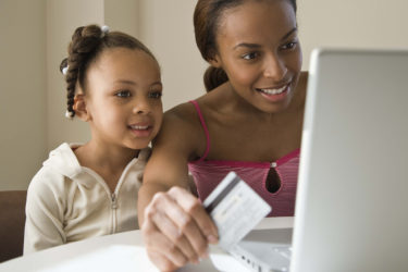 Mother and daughter on laptop