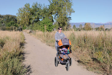 Mother jogging with stroller