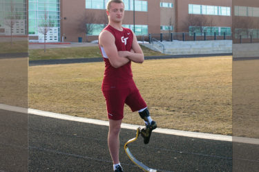 Runner posing on track