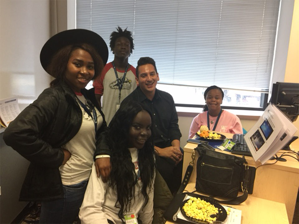 Teens in a room talking