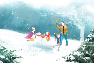Family playing in the snow