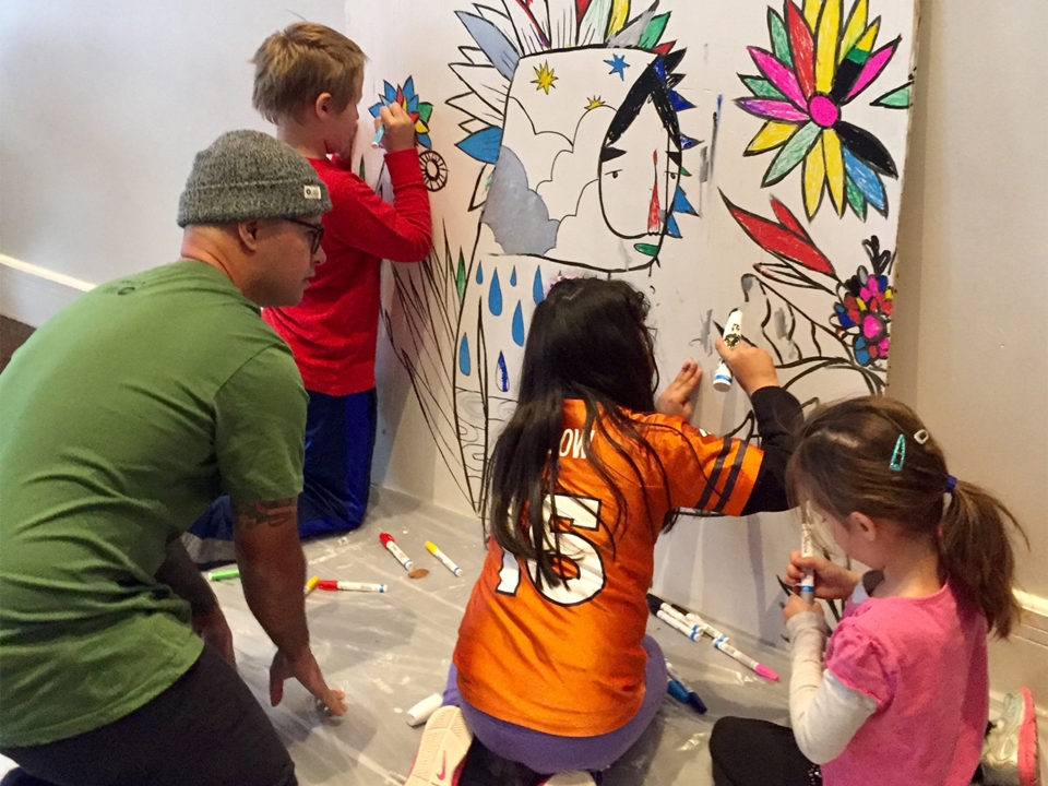 Kids working on mural