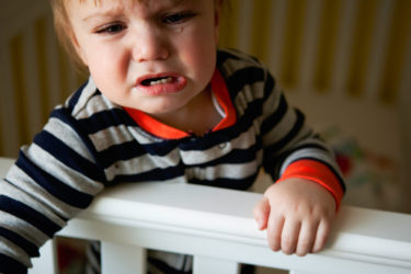 Baby Boy Crying in Crib