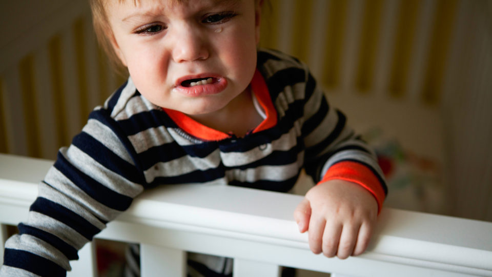 Baby Boy Crying in Crib