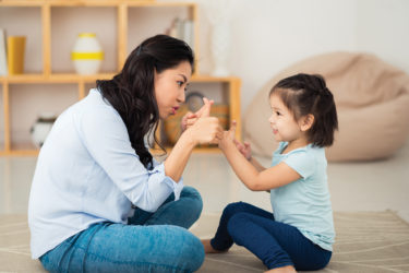 Mother talking to toddler