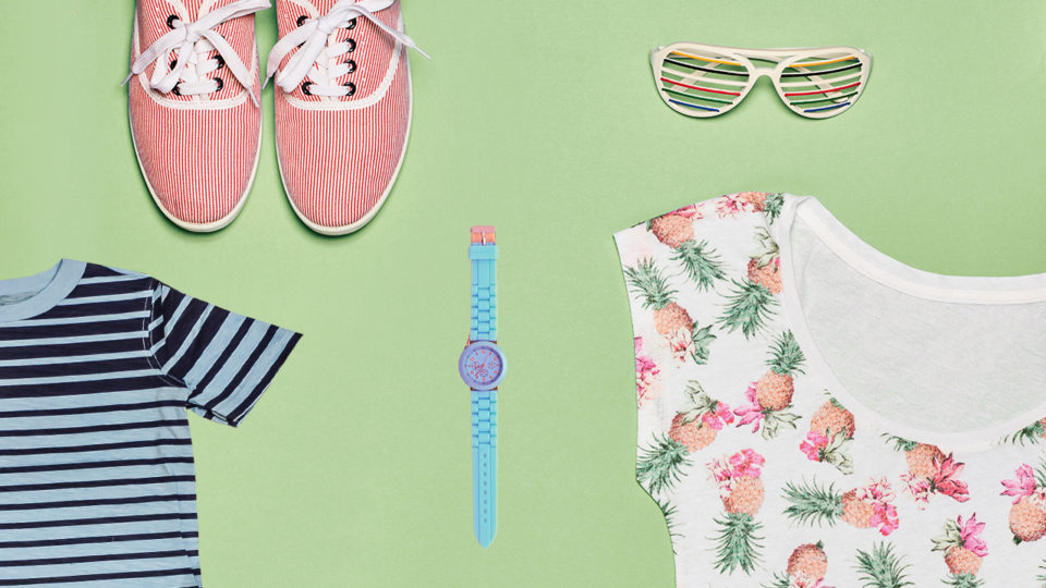 Secondhand clothing isolated on green