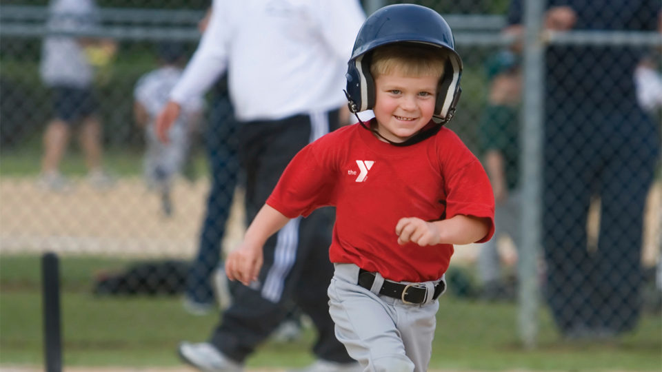 Boy playing baseball