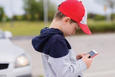 Boy with cell phone