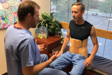 Dr. Jaren Riley and patient