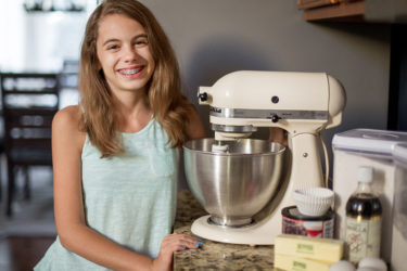 Audra Tow with her kitchenaid mixer