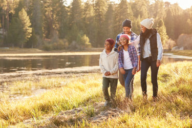 Family hiking in mountains