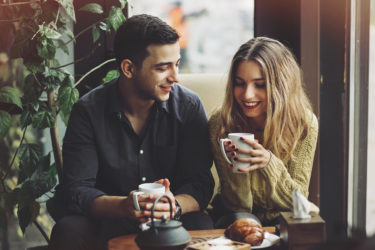 Couple drinking coffee on date night