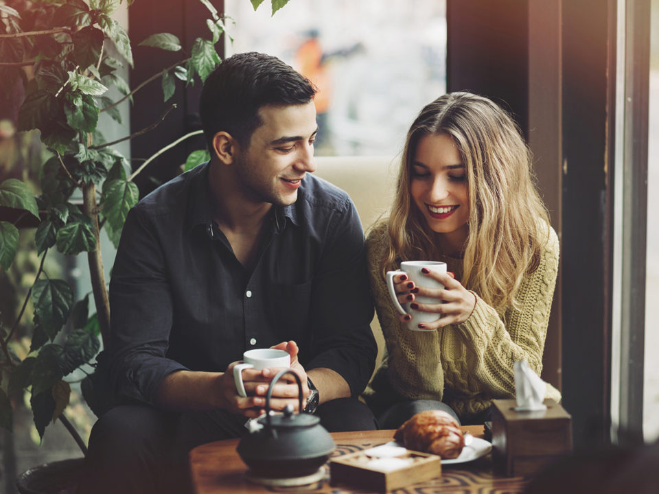 Couple drinking coffee on date night