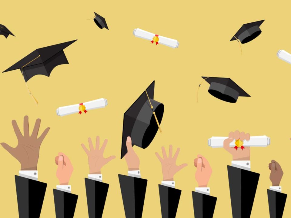 graduation caps being thrown