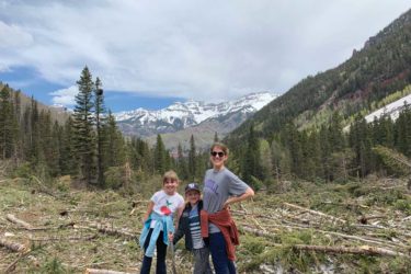 Family in front of mountains