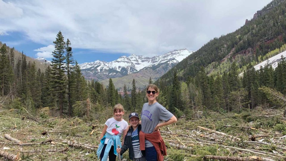 Family in front of mountains
