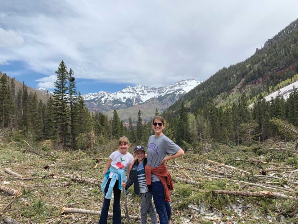 Family in front of mountains