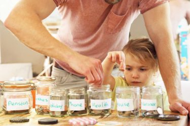 Girl and father budgeting