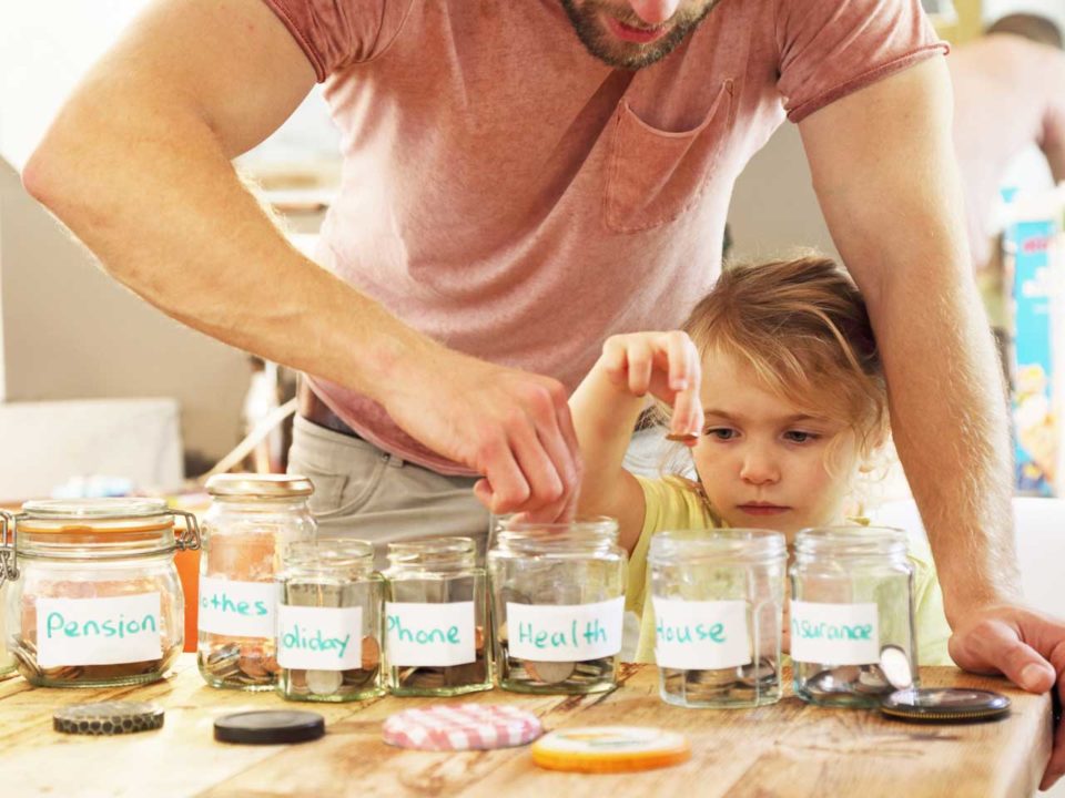 Girl and father budgeting