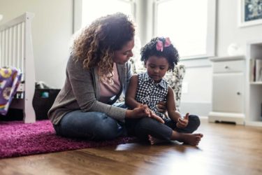 Mother supportively listening to child
