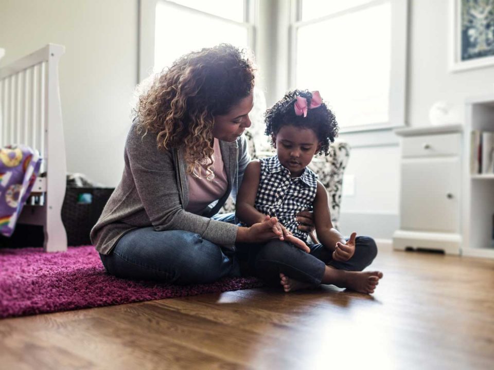 Mother supportively listening to child