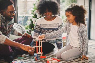 Family playing game at home