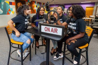 Students recording podcast