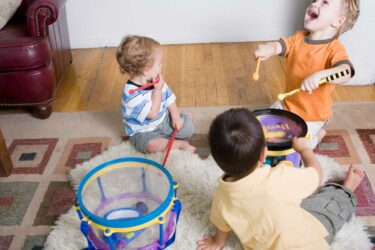 Boys with musical toys