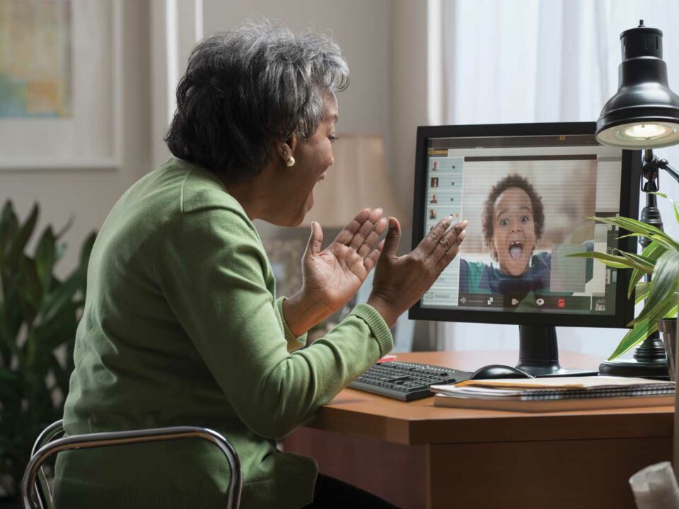 Grandmother videochatting with child