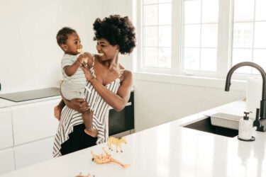 Mother and baby in a clean kitchen