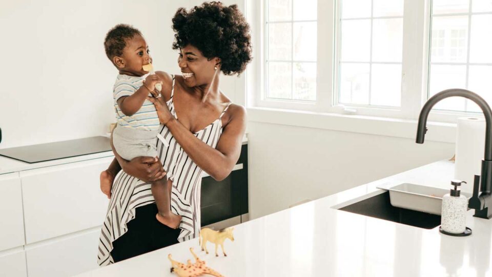 Mother and baby in a clean kitchen