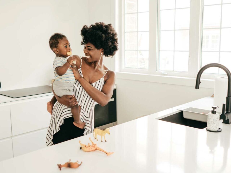 Mother and baby in a clean kitchen