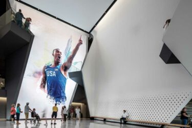 Visitors in the atrium at U.S. Olympic and Paralympic Center