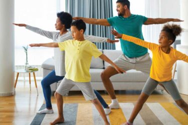 family doing yoga