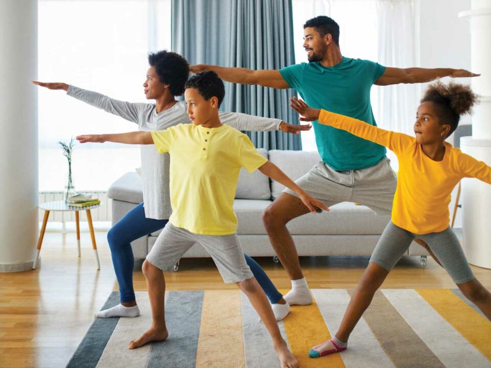 family doing yoga