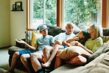 Family talking on a couch