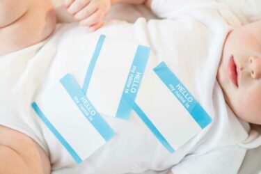 baby with name tag