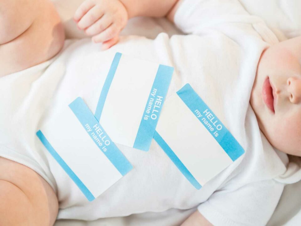 baby with name tag