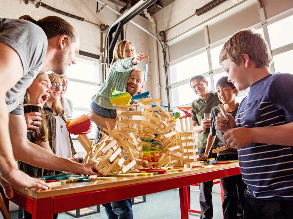 Children playing with wood pieces
