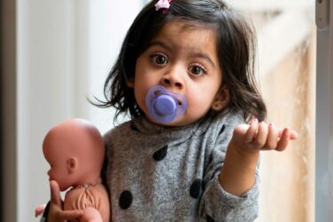 Toddler with pacifier