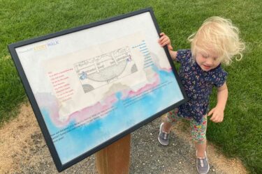 Child at a storywalk in Broomfield