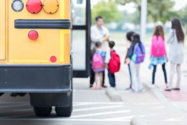 Kids getting on school bus, Federal Tax Credit Scholarship