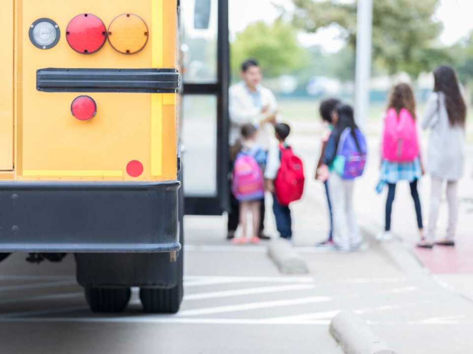 Kids getting on school bus, Federal Tax Credit Scholarship