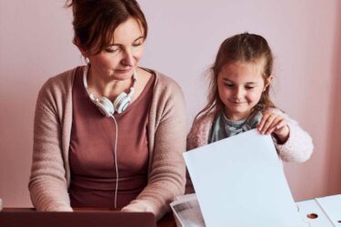 Mother and child with paperwork