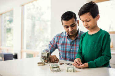 Father and son counting money