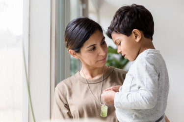Parent and son having a quiet talk